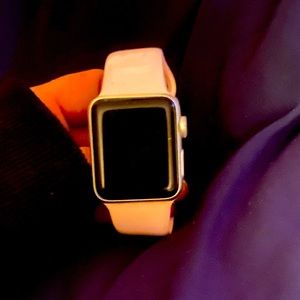 Apple Watch Series 2 (With A Light Pink Band)